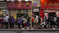 Warga sendiri telah menuntut perbatasan dengan daratan China ditutup untuk menangkal penyebaran virus. AP Photo/Vincent Yu.