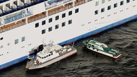 Sementara itu, 3.700 orang yang ada di kapal akan dikarantina selama 14 hari. Hiroko Harima/Kyodo News via AP.