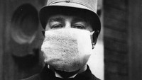 Wabah penyakit lain yang tak kalah mematikan adalah Flu Spanyol. Virus ini diketahui muncul usai Perang Dunia I yaitu sekitar tahun 1918. Topical Press Agency/Getty Images