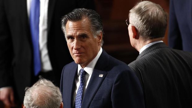 Sen. Mitt Romney, R-Utah, arrives before President Donald Trump delivers his State of the Union address to a joint session of Congress on Capitol Hill in Washington, Tuesday, Feb. 4, 2020. (AP Photo/Patrick Semansky)