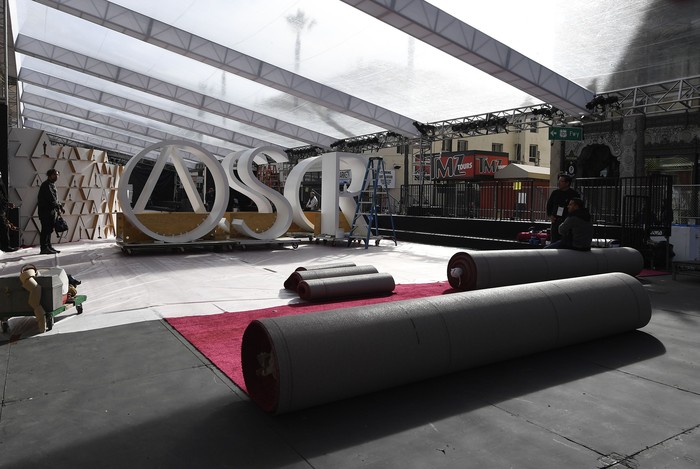 HOLLYWOOD, CA - FEBRUARY 05: Scenic artist Dena D'Angelo spray paints a baby Oscar statue gold for the 92nd Annual Academy Awards on Hollywood Boulevard on February 5, 2020 in Hollywood, California. (Photo by Kevork Djansezian/Getty Images)