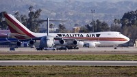 Pesawat Kalitta Air disewa oleh Amerika Serikat untuk mengevakuasi warganya dari kota Wuhan, China. Pesawat tersebut mendarat di California pada Rabu (29/1/2020). AP Photo/Ringo HW Chiu.