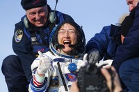 U.S. astronaut Christina Koch reacts shortly after the landing of the Russian Soyuz MS-13 space capsule about 150 km ( 80 miles) south-east of the Kazakh town of Zhezkazgan, Kazakhstan, Thursday, Feb. 6, 2020. A Soyuz space capsule with U.S. astronaut Christina Koch, Italian astronaut Luca Parmitano and Russian cosmonaut Alexander Skvortsov, returning from a mission to the International Space Station landed safely on Thursday on the steppes of Kazakhstan. Koch wrapped up a 328-day mission on her first flight into space, providing researchers the opportunity to observe effects of long-duration spaceflight on a woman as the agency plans to return to the Moon under the Artemis program. (Sergei Ilnitsky/Pool Photo via AP)