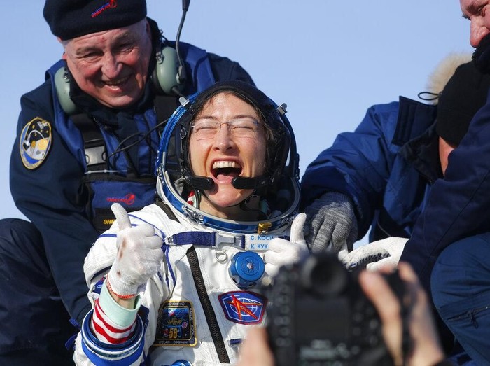 U.S. astronaut Christina Koch reacts shortly after the landing of the Russian Soyuz MS-13 space capsule about 150 km ( 80 miles) south-east of the Kazakh town of Zhezkazgan, Kazakhstan, Thursday, Feb. 6, 2020. A Soyuz space capsule with U.S. astronaut Christina Koch, Italian astronaut Luca Parmitano and Russian cosmonaut Alexander Skvortsov, returning from a mission to the International Space Station landed safely on Thursday on the steppes of Kazakhstan. Koch wrapped up a 328-day mission on her first flight into space, providing researchers the opportunity to observe effects of long-duration spaceflight on a woman as the agency plans to return to the Moon under the Artemis program. (Sergei Ilnitsky/Pool Photo via AP)