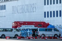 YOKOHAMA, JAPAN - FEBRUARY 06: An ambulance carries a coronavirus victim from the Diamond Princess cruise ship while it is docked at Daikoku Pier where it will be resupplied and newly diagnosed coronavirus cases taken to hospital as it remains in quarantine off the port of Yokohama after a number of the 3,700 people on board were confirmed to have coronavirus, on February 6, 2020 in Yokohama, Japan. 20 passengers are confirmed to be infected with coronavirus as Japanese authorities continue screening people on board. The new cases bring the total number of confirmed infections to 45 in Japan, the largest number outside of China. (Photo by Carl Court/Getty Images)