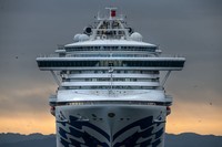 YOKOHAMA, JAPAN - FEBRUARY 06: An ambulance carries a coronavirus victim from the Diamond Princess cruise ship while it is docked at Daikoku Pier where it will be resupplied and newly diagnosed coronavirus cases taken to hospital as it remains in quarantine off the port of Yokohama after a number of the 3,700 people on board were confirmed to have coronavirus, on February 6, 2020 in Yokohama, Japan. 20 passengers are confirmed to be infected with coronavirus as Japanese authorities continue screening people on board. The new cases bring the total number of confirmed infections to 45 in Japan, the largest number outside of China. (Photo by Carl Court/Getty Images)