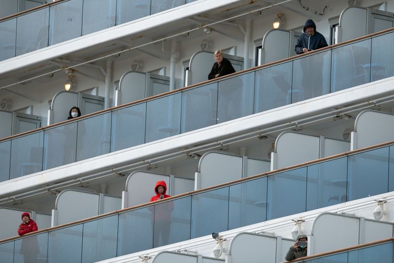 YOKOHAMA, JAPAN - FEBRUARY 06: An ambulance carries a coronavirus victim from the Diamond Princess cruise ship while it is docked at Daikoku Pier where it will be resupplied and newly diagnosed coronavirus cases taken to hospital as it remains in quarantine off the port of Yokohama after a number of the 3,700 people on board were confirmed to have coronavirus, on February 6, 2020 in Yokohama, Japan. 20 passengers are confirmed to be infected with coronavirus as Japanese authorities continue screening people on board. The new cases bring the total number of confirmed infections to 45 in Japan, the largest number outside of China. (Photo by Carl Court/Getty Images)