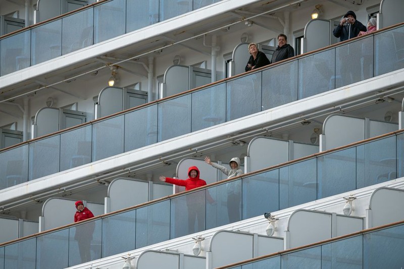 YOKOHAMA, JAPAN - FEBRUARY 06: An ambulance carries a coronavirus victim from the Diamond Princess cruise ship while it is docked at Daikoku Pier where it will be resupplied and newly diagnosed coronavirus cases taken to hospital as it remains in quarantine off the port of Yokohama after a number of the 3,700 people on board were confirmed to have coronavirus, on February 6, 2020 in Yokohama, Japan. 20 passengers are confirmed to be infected with coronavirus as Japanese authorities continue screening people on board. The new cases bring the total number of confirmed infections to 45 in Japan, the largest number outside of China. (Photo by Carl Court/Getty Images)