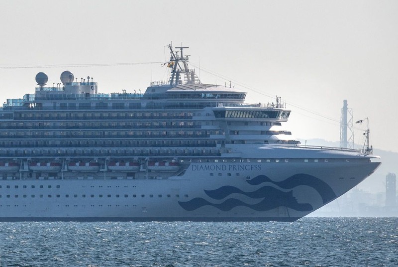 YOKOHAMA, JAPAN - FEBRUARY 06: An ambulance carries a coronavirus victim from the Diamond Princess cruise ship while it is docked at Daikoku Pier where it will be resupplied and newly diagnosed coronavirus cases taken to hospital as it remains in quarantine off the port of Yokohama after a number of the 3,700 people on board were confirmed to have coronavirus, on February 6, 2020 in Yokohama, Japan. 20 passengers are confirmed to be infected with coronavirus as Japanese authorities continue screening people on board. The new cases bring the total number of confirmed infections to 45 in Japan, the largest number outside of China. (Photo by Carl Court/Getty Images)