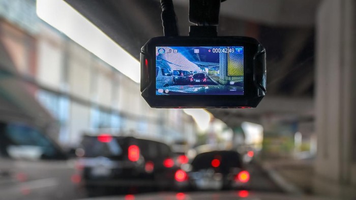 Dash Camera or car video recorder in vehicle on the way