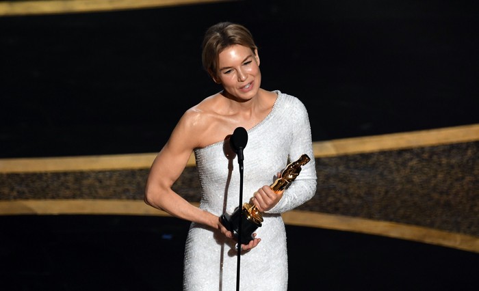 HOLLYWOOD, CALIFORNIA - FEBRUARY 09: RenÃ©e Zellweger accepts the Actress in a Leading Role award for Judy onstage during the 92nd Annual Academy Awards at Dolby Theatre on February 09, 2020 in Hollywood, California. (Photo by Kevin Winter/Getty Images)