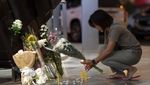 Bunga dan Lilin Hiasi Lokasi Penembakan Brutal di Thailand