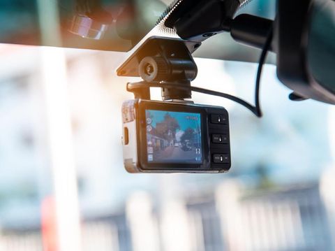 Car video camera attached to the windshield to record driving and prevent danger from driving