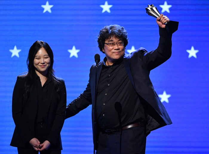 1201596030 SANTA BARBARA, CALIFORNIA - JANUARY 23: Sharon Choi and Bong Joon-ho speak onstage at the Outstanding Directors of the Year during the 35th Santa Barbara International Film Festival at the Arlington Theatre on January 23, 2020 in Santa Barbara, California. (Photo by Matt Winkelmeyer/Getty Images for SBIFF)