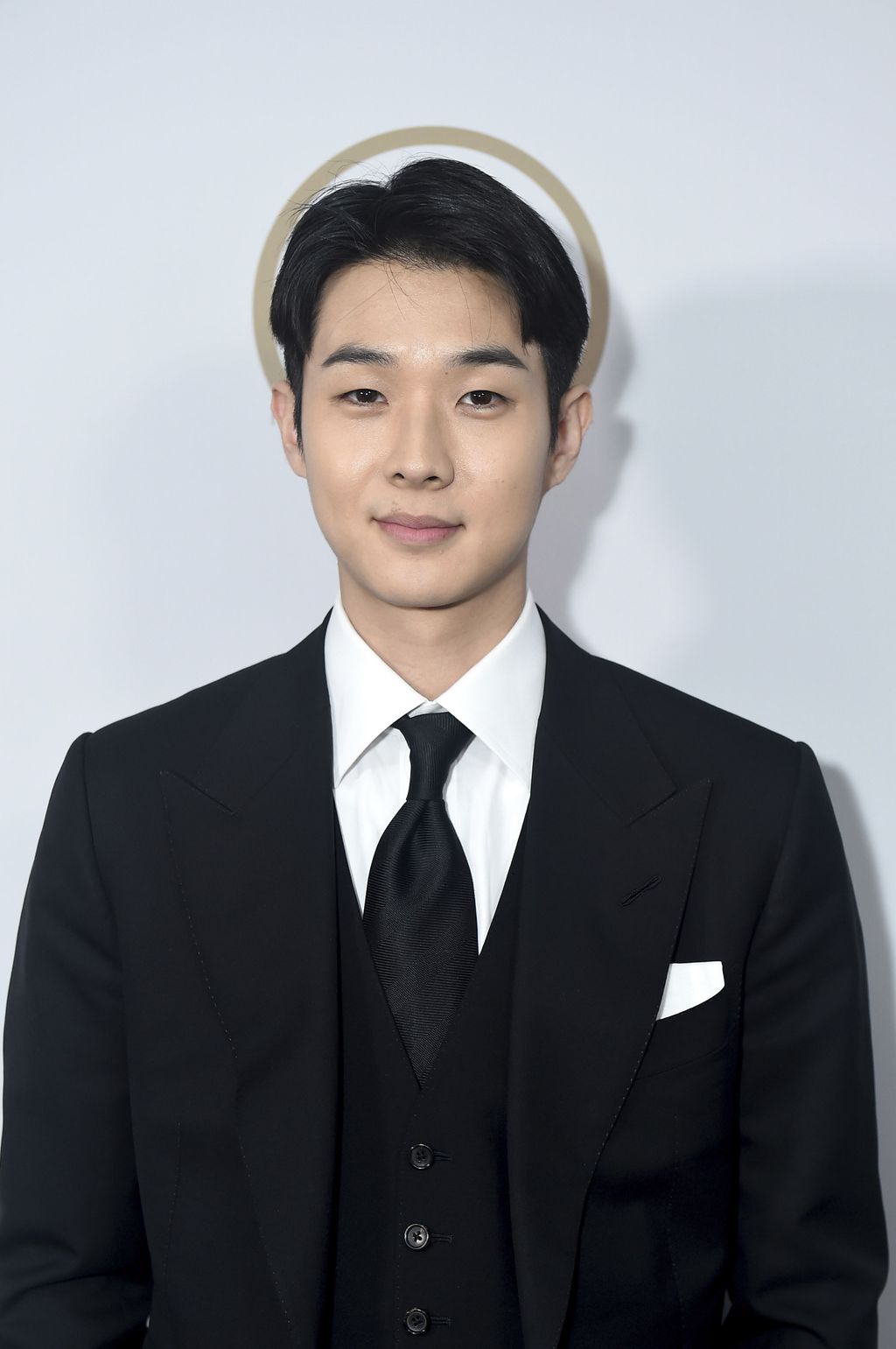 Pemain Film Parasite Choi Woo Shik. (Photo by Jordan Strauss/Invision for the Producers Guild of America/AP Images)