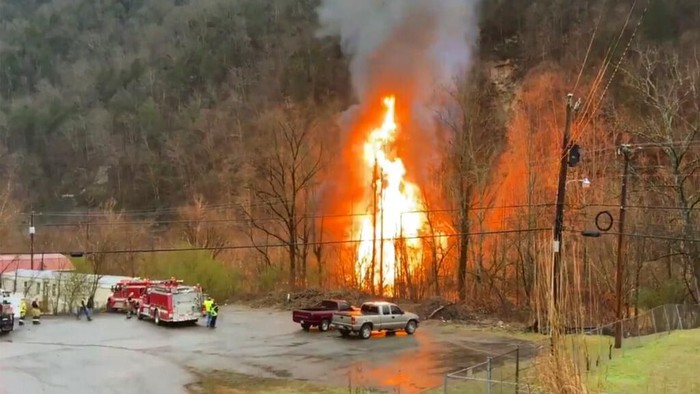 First responders are on the scene of a train derailment at in eastern Kentucky, Thursday, Feb. 13, 2020.  Two crew members of the CSX train were initially trapped and a flammable liquid was leaking into a nearby river, said Charles Maynard with Pike County Emergency Management. Maynard said he want sure if the crew members were injured but that crews were trying to extricate them. He wasnt aware of any other reports of possible injuries. (Russ Cassady/Appalachian News-Express via AP)