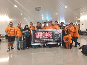 Misi Kemanusiaan ala Penunggang Moge Berjas Putih