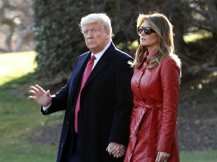 WASHINGTON, DC - FEBRUARY 14: U.S. President Donald Trump and First Lady Melania Trump walk on the south lawn heading to Palm Beach for the weekend on February 14, 2020 in Washington, DC. (Photo by Tasos Katopodis/Getty Images)