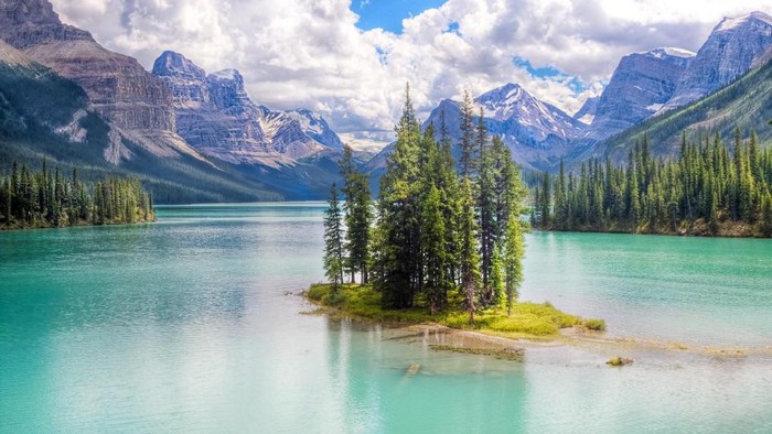 Spirit Island in the Maligne Lake, near Jasper, AB, Canada (Jasper National Park). HDR shot. Water colour is due to the fact that most of it comes from glacier.