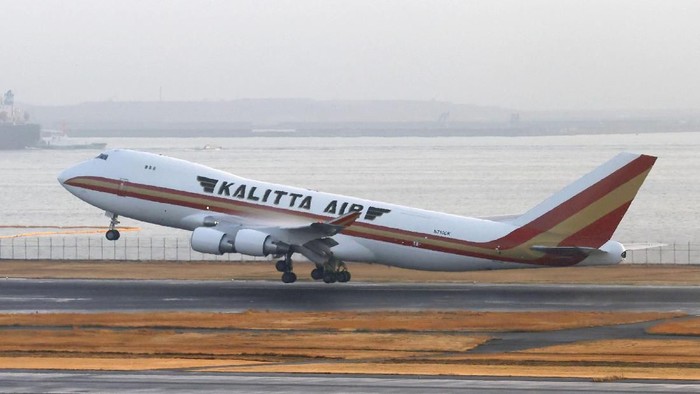An airplane chartered by the U.S. government takes off at Haneda airport in Tokyo with Americans tourists who were aboard the quarantined cruise ship the Diamond Princess docked at Yokohama, Monday, Feb. 17, 2020. The cruise ship was carrying nearly 3,500 passengers and crew members under quarantine until at least Feb. 19. (Sadayuki Goto/Kyodo News via AP)