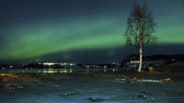 The aurora borealis, or Northern Lights, are seen near the city of Trondheim, Norway Tuesday Jan. 23, 2012. Stargazers were out in force in northern Europe on Tuesday, hoping to be awed by a spectacular showing of northern lights after the most powerful solar storm in six years.  (AP Photo/Emil Bratt Borsting)