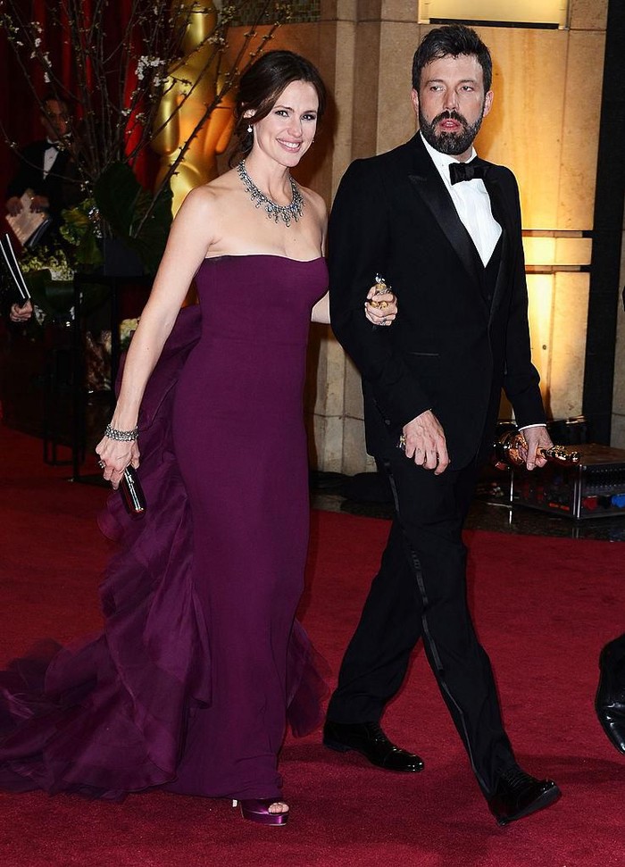HOLLYWOOD, CA - FEBRUARY 24: Actress Jennifer Garner (L) and actor/director Ben Affleck, winner of Best Picture for 'Argo', departs the Oscars at Hollywood & Highland Center on February 24, 2013 in Hollywood, California. (Photo by Frazer Harrison/Getty Images)