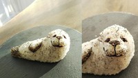 Kalau bentuk onigirinya seperti singa laut ini, jadi sayang dimakan ya? Onigiri Gekijou banyak berkreasi dengan nori untuk menghias onigirinya. Foto: Onigiri Gekijou