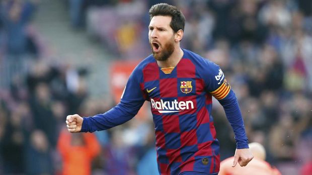 Barcelona's Lionel Messi celebrates after scoring his side's opening goal during a Spanish La Liga soccer match between Barcelona and Eibar at the Camp Nou stadium in Barcelona, Spain, Saturday Feb. 22, 2020. (AP Photo/Joan Monfort)