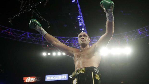 Tyson Fury, of England, celebrates during a WBC heavyweight championship boxing match against Deontay Wilder Saturday, Feb. 22, 2020, in Las Vegas. (AP Photo/Isaac Brekken)