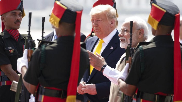 US President Donald Trump speaks to the press after disembarking from Air Force One upon his arrival at Prestwick Airport, south of Glasgow on July 25, 2025, on the first day of his UK visit. US President Donald Trump departed for Scotland on July 25, 2025 for a mix of diplomacy, business and leisure, as a huge UK security operation swung into place amid planned protests near his family-owned golf resorts. (Photo by Brendan SMIALOWSKI / AFP)