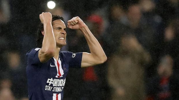 edinson cavani paris saint-germain liga prancis ligue 1 PSG's Edinson Cavani celebrates his goal against Bordeaux during the French League One soccer match between Paris-Saint-Germain and Bordeaux at the Parc des Princes stadium in Paris, Sunday Feb. 23, 2020. (AP Photo/Christophe Ena)