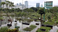 Kawasan Tempat Pemakaman Umum (TPU) Karet Bivak, Jakarta, tampak masih terendam banjir, Rabu (26/2/2020).