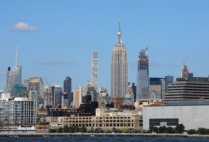 NEW YORK, NEW YORK - AUGUST 29: General view of the Empire State Building and midtown Manhattan as photographed from the Hudson River on August 29, 2019 in New York City.  (Photo by Bruce Bennett/Getty Images)