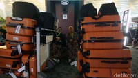 Sejumlah koper masih tertumpuk di Terminal 3, Bandara Soekarno Hatta, Tangerang, Kamis (27/2/2020).