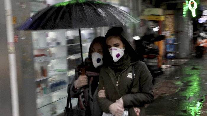 A worker disinfects subway trains against coronavirus in Tehran, Iran, in the early morning of Wednesday, Feb. 26, 2020. Irans government said Tuesday that more than a dozen people had died nationwide from the new coronavirus, rejecting claims of a much higher death toll of 50 by a lawmaker from the city of Qom that has been at the epicenter of the virus in the country. (AP Photo/Ebrahim Noroozi)