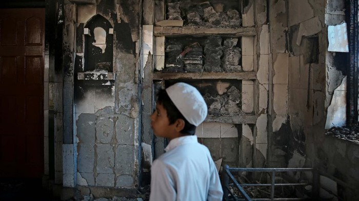 Relatives and neighbors wail near the body of Mohammad Mudasir, 31, who was killed in communal violence in New Delhi, India, Thursday, Feb. 27, 2020. India accused a U.S. government commission of politicizing communal violence in New Delhi that killed at least 30 people and injured more than 200 as President Donald Trump was visiting the country. The violent clashes between Hindu and Muslim mobs were the capitals worst communal riots in decades and saw shops, Muslim shrines and public vehicles go up in flames. (AP Photo/Manish Swarup)