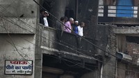 Bentrokan ini dipicu serangan terhadap kelompok Muslim penolak Undang-Undang Citizienship Amendement Bill (CAB) oleh kelompok Hindu pendukung UU tersebut. Undang-Undang Kewarganegaraan tersebut dianggap diskriminatif terhadap umat Muslim. AP Photo/Rajesh Kumar Singh.