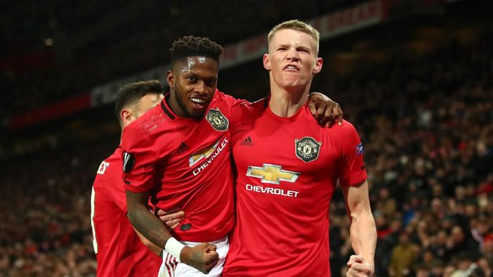 Manchester United MANCHESTER, ENGLAND - FEBRUARY 27: Scott McTominay of Manchester United celebrates with teammate Fred of Manchester United after scoring his teams third goal during the UEFA Europa League round of 32 second leg match between Manchester United and Club Brugge at Old Trafford on February 27, 2020 in Manchester, United Kingdom. (Photo by Clive Brunskill/Getty Images)
