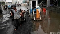 Seorang tuna wisma saat mendotong gerobak miliknya saat melintas jalan rusak. Pradita Utama/detikcom.