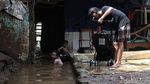 Potret Warga Kebon Pala yang Bersahabat dengan Banjir
