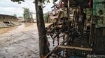 Potret Warga Kebon Pala yang Bersahabat dengan Banjir