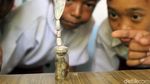 Sosok Tuyul dalam Botol Ini Bikin Geger Warga Ciamis
