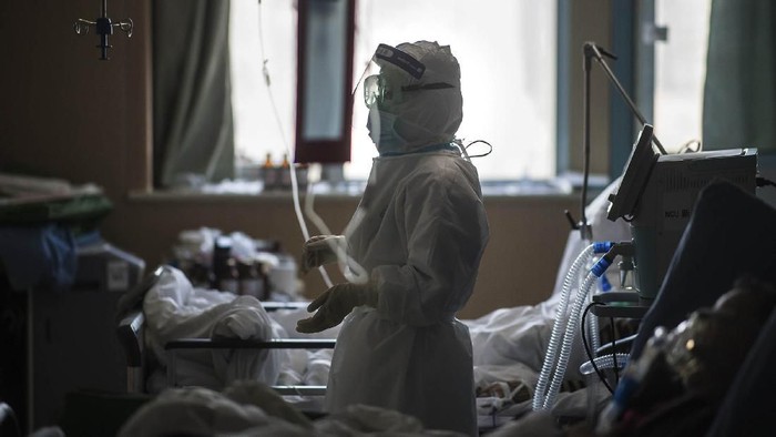 Ambulances carrying patients infected with the novel coronavirus arrive at a hospital in Daegu, South Korea, Sunday, Feb. 23, 2020. South Koreas president has put the country on its highest alert for infectious diseases and says officials should take 