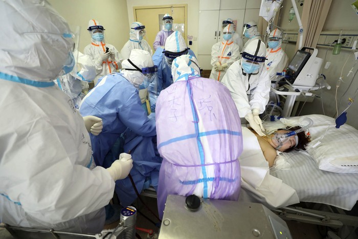 Ambulances carrying patients infected with the novel coronavirus arrive at a hospital in Daegu, South Korea, Sunday, Feb. 23, 2020. South Korea's president has put the country on its highest alert for infectious diseases and says officials should take 