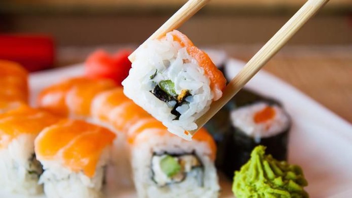 sushi Big futomaki sushi with salmon, prawn tempura and cucumber