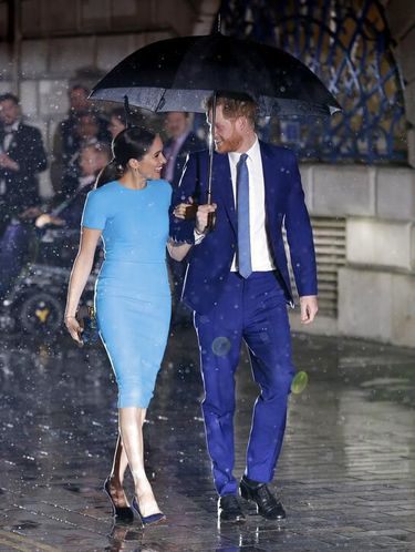 Britain's Prince Harry and Meghan, the Duchess of Sussex, leave after attending the annual Endeavour Fund Awards in London, Thursday, March 5, 2020. The awards celebrate the achievements of service personnel who were injured in service and have gone on to use sport as part of their recovery and rehabilitation. (AP Photo/Kirsty Wigglesworth)