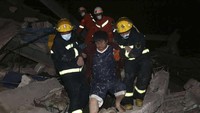 Hotel ini sebelumnya digunakan untuk mengkarantina pasien pengidap virus corona. Chinatopix Via AP.