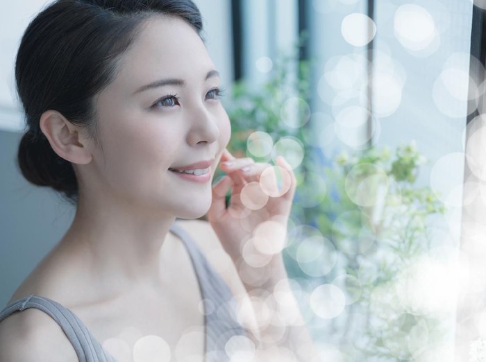Beauty concept of a young asian woman. Skin care. Body care. Cosmetics.