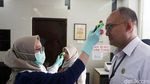 Pemeriksaan Suhu Tubuh di Kemenko PMK