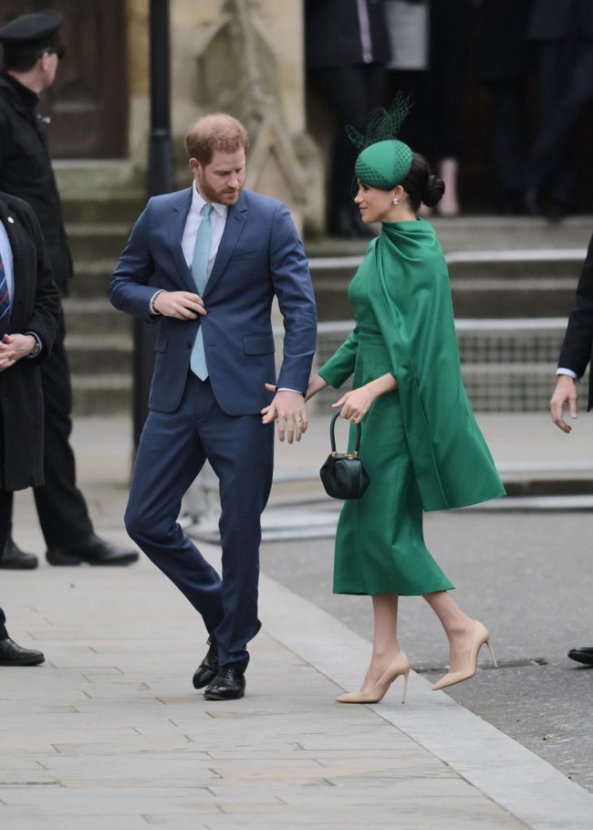 Ini menjadi detik-detik terakhir Pangeran Harry dan Meghan Markle melepas keanggotan kerajaan Inggris. Pasangan tersebut hadir untuk terakhir kalinya sebagai anggota senior Kerajaan Inggris di acara kebaktian Commonwealth Day Service, London, Inggris, Senin (9/3/2020). Inilah arti bahasa tubuh mereka. Foto: Gareth Cattermole/Getty Images
